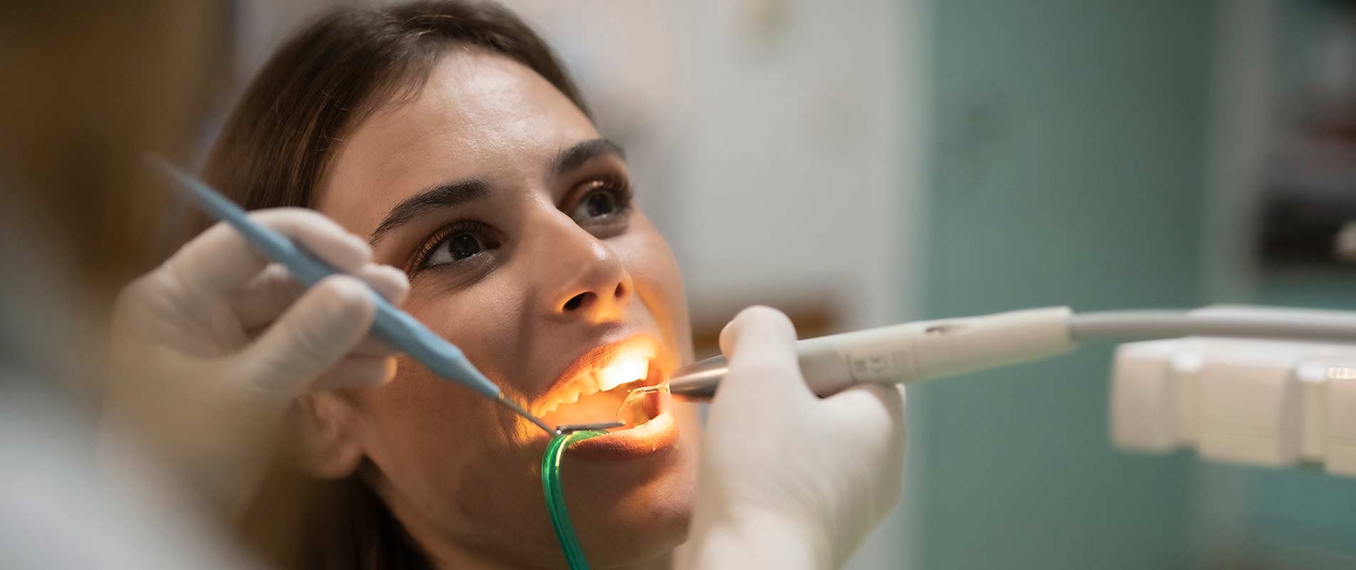 lady taking care her teeth